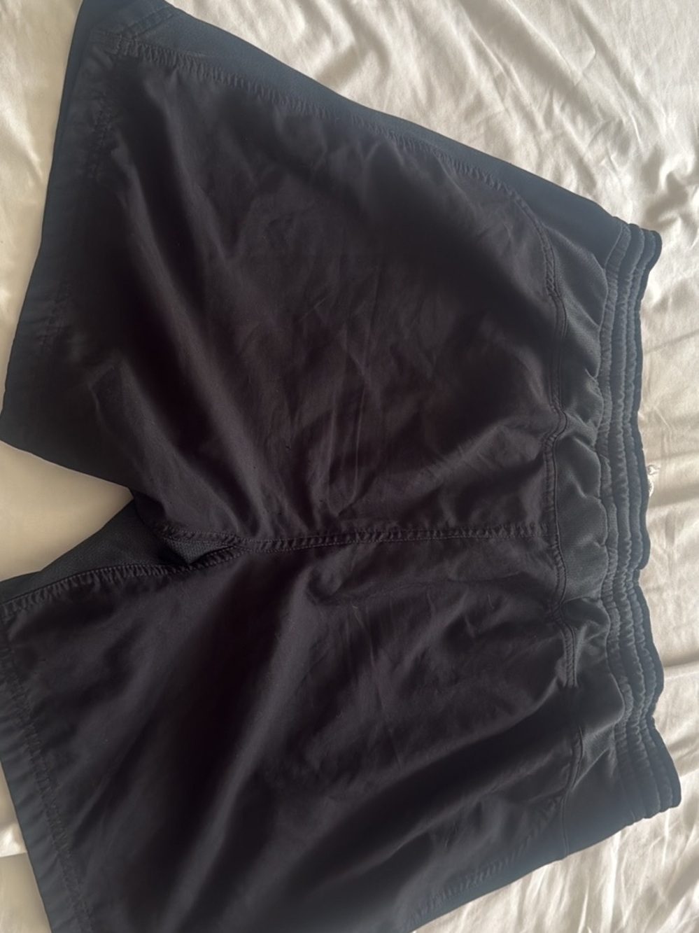 Nike Women’s Black Athletic Shorts with Yellow Swoosh Accent - Picture 2 of 3